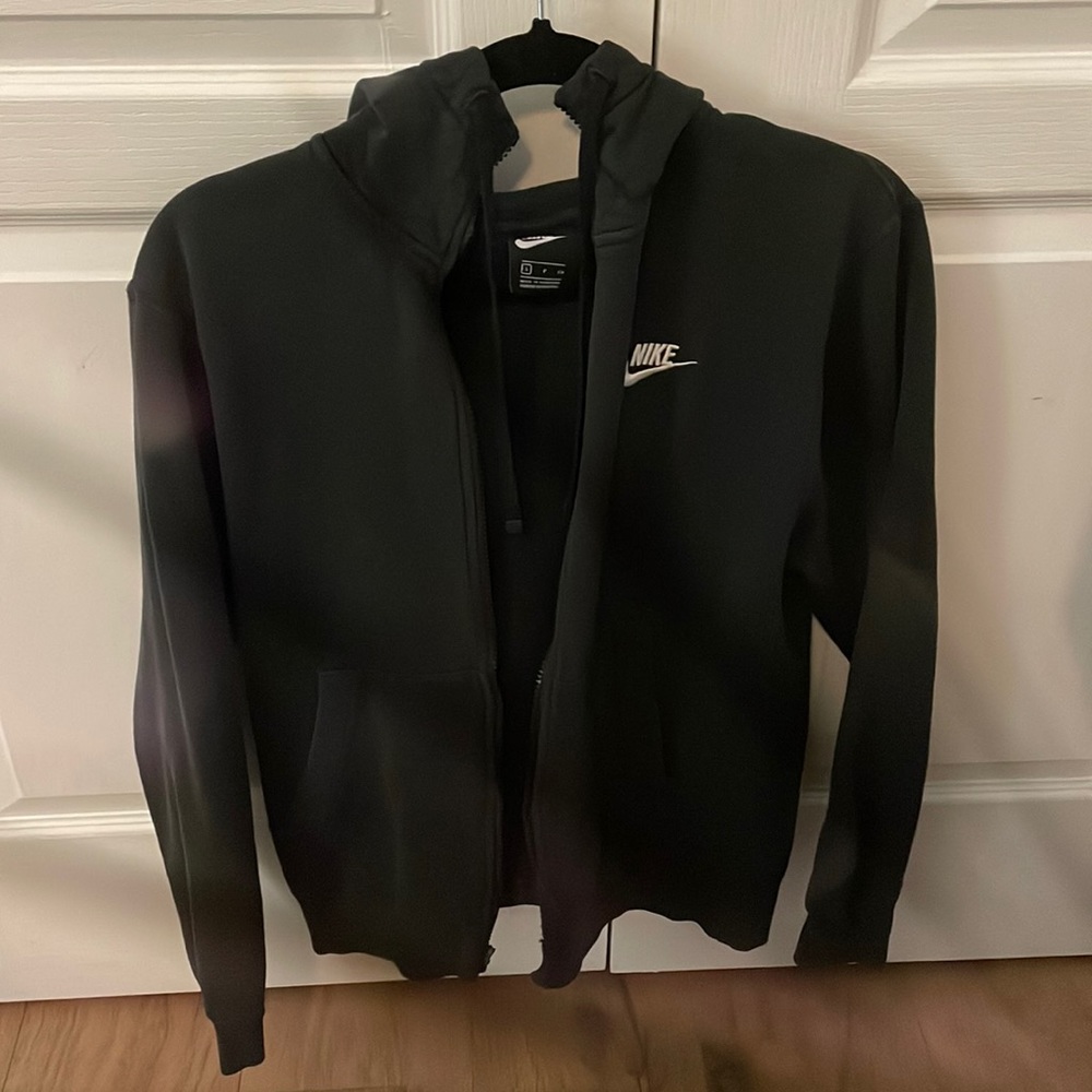 NIKE size small black with like a tiniest bit of white